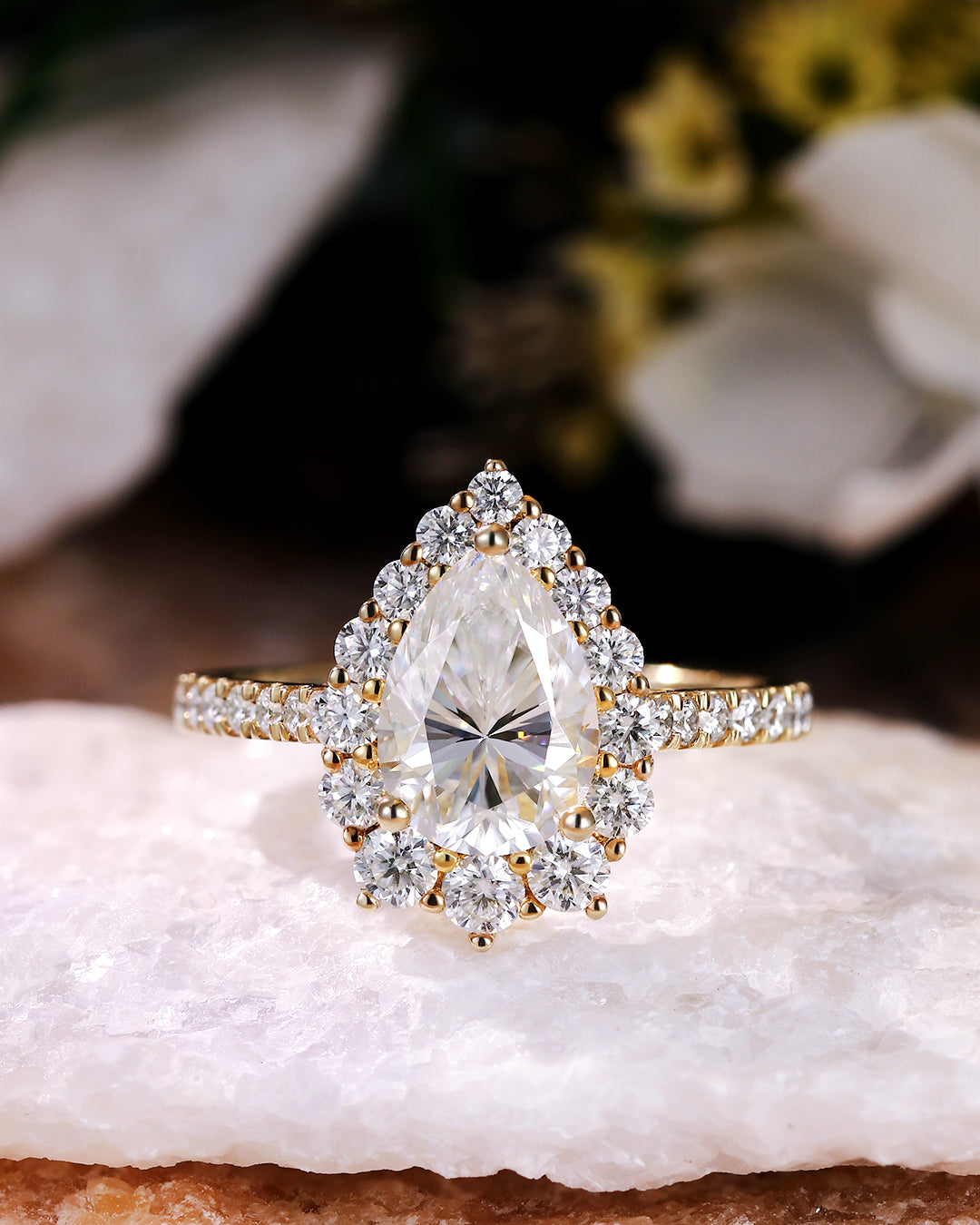 moissanite Diamond ring with a pear-shaped center stone